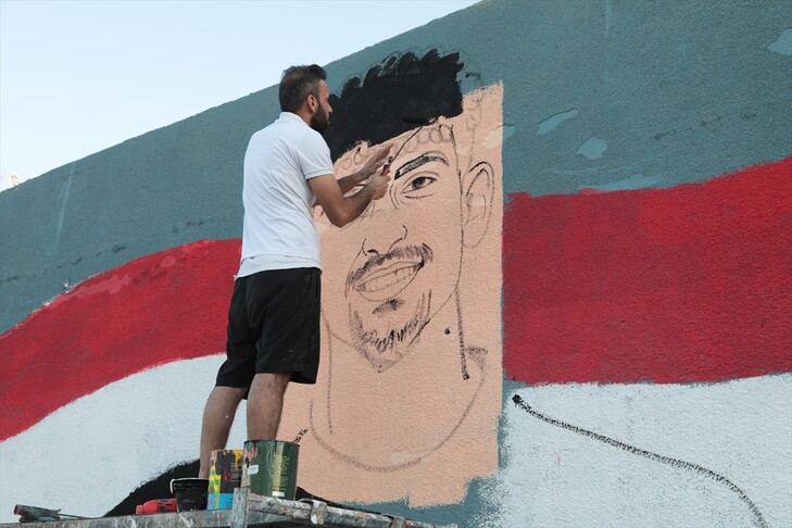 Iraklı grafiti sanatçısı 40 yıl sonra gelen Dünya Kupası sevincini Bağdat'ın duvarlarına taşıdı