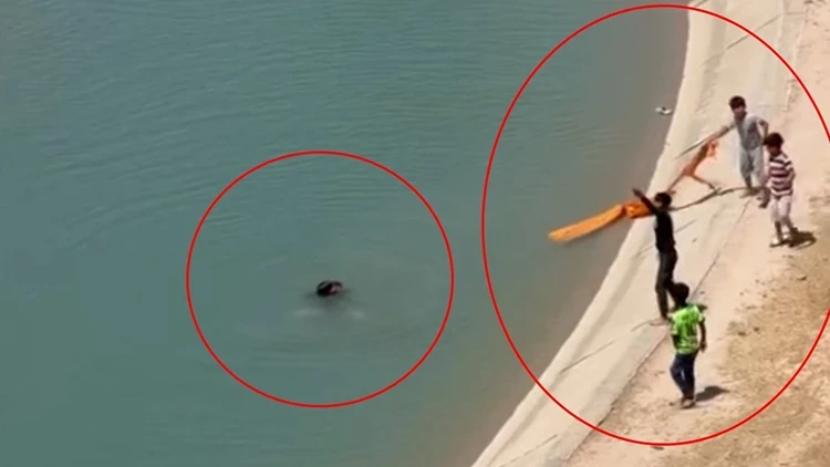 Batman’da ilginç görüntüler! Akıntıya kapılan 2 kişiyi halat ve çekpasla kurtardılar