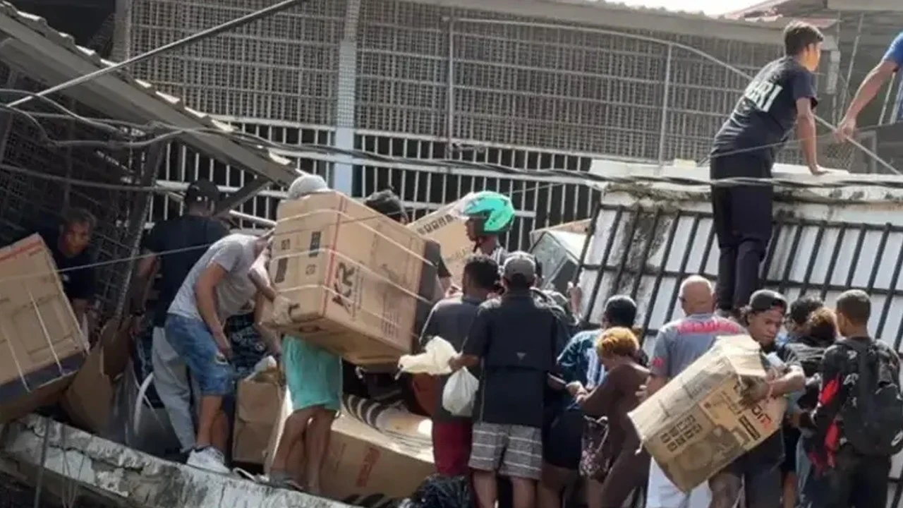 Venezuela'da skandal görüntüler! Deprem yetmedi, polisler bile yağmaya karıştı! O anlar kamerada