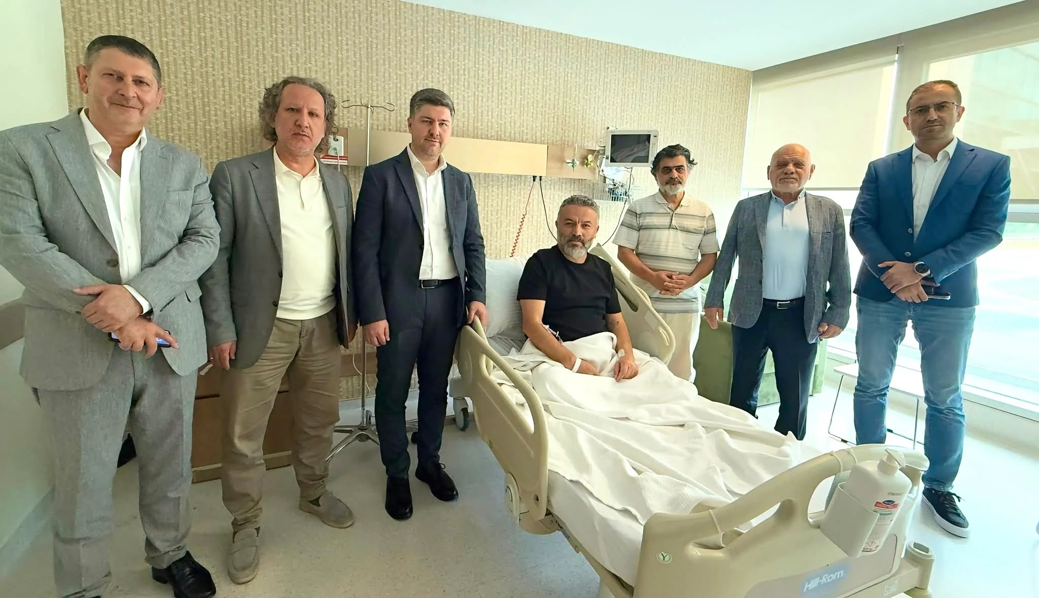 Coşkun'a geçmiş olsun ziyareti
