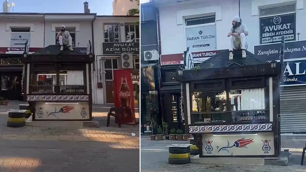Yıkım kararı verilmişti: Büfesinin üzerine çıkıp kendini zincirledi