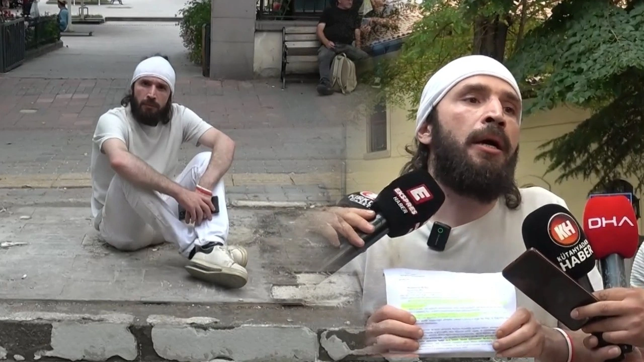 Büfesinin üzerine çıkıp kendini zincirledi!