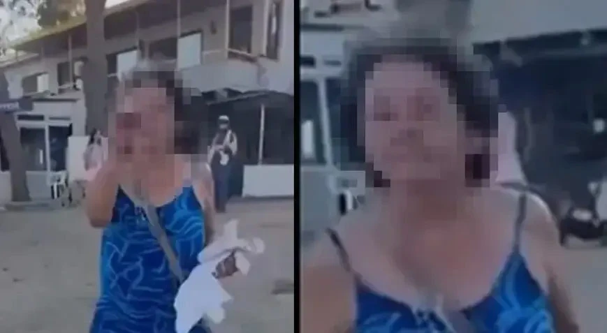 İzmir'de anne ve kızına plajda hakaret ettiği öne sürülen kadın, yeniden gözaltına alındı