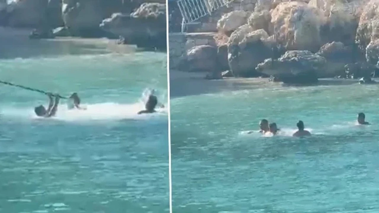Mersin'de deniz ortasında sopalı kavga: O anlar kamerada