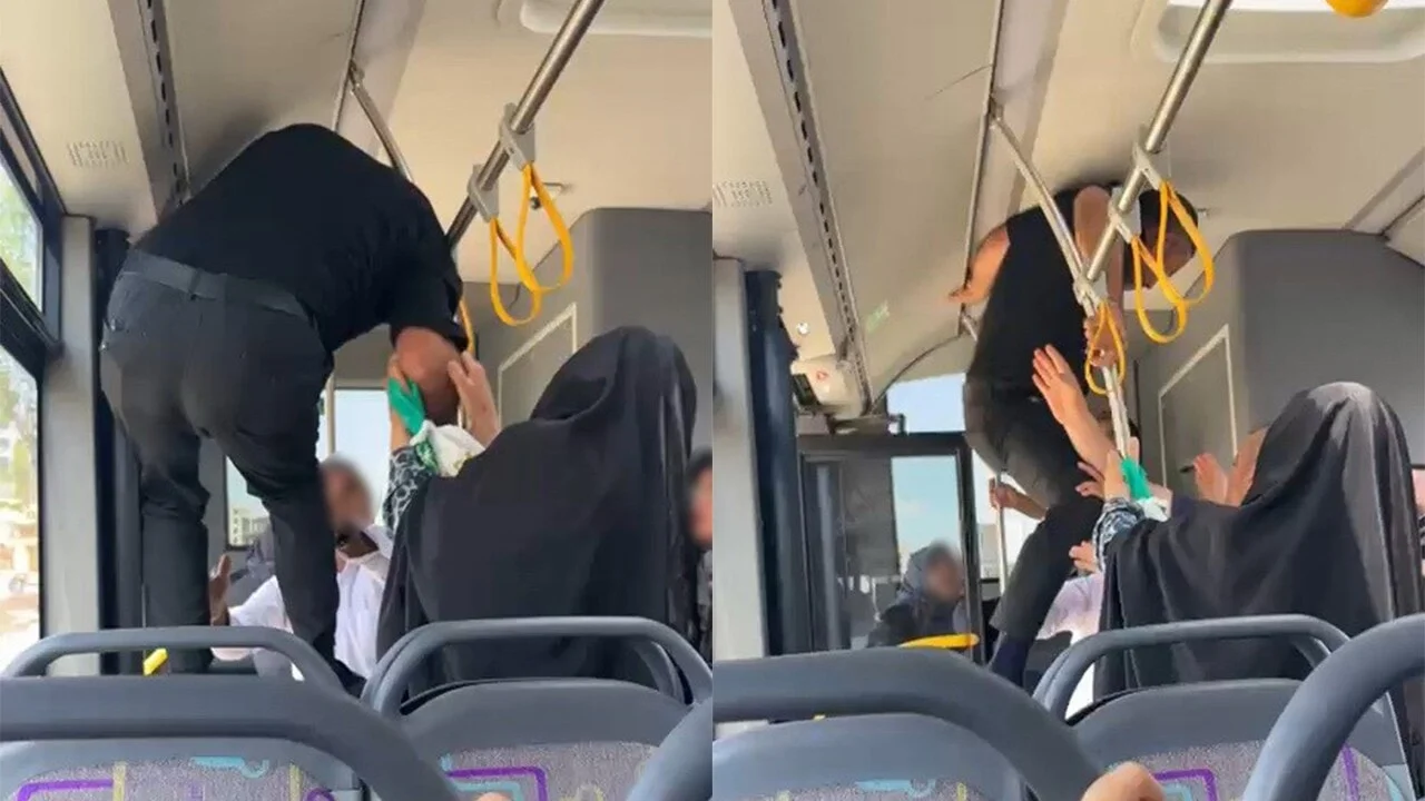 Otobüste tekmeli, yumruklu kavgada yola savruldu