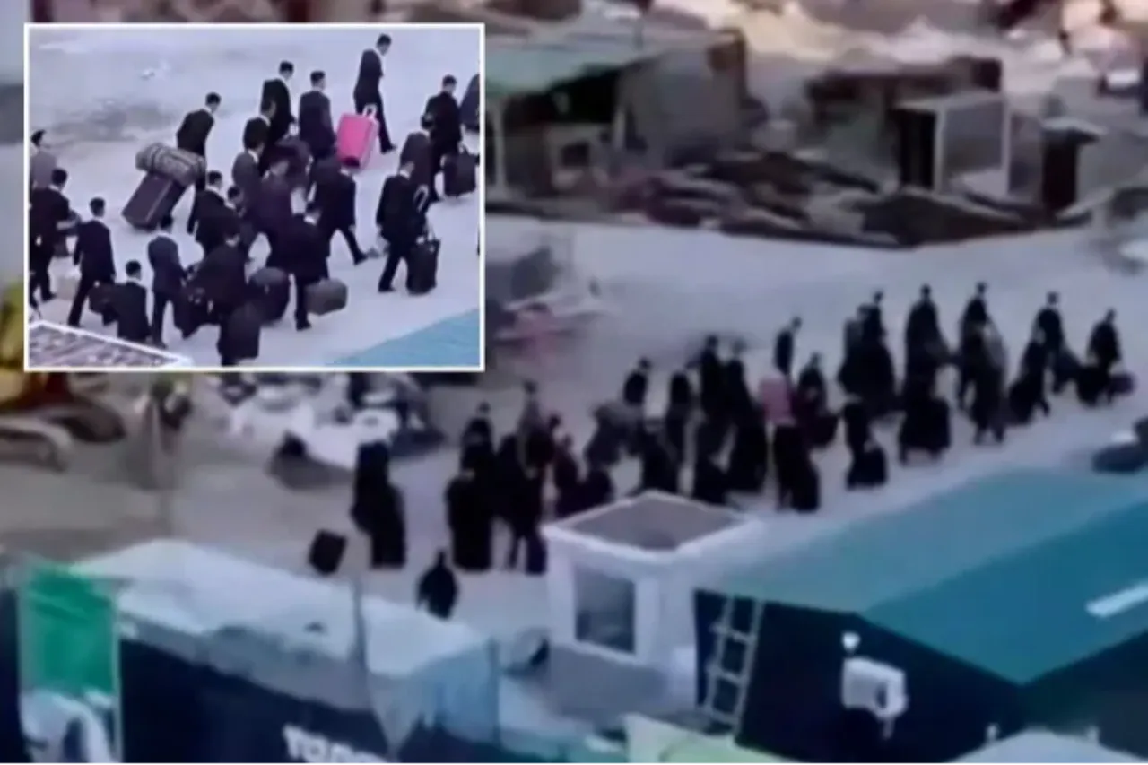 Rusya şantiyelerindeki takım elbiseli Kuzey Koreli köleler ifşa oldu!