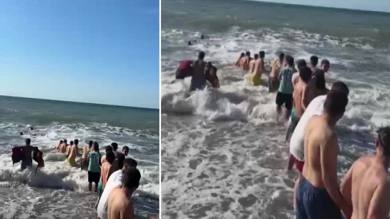 Dalgalara karşı insan zinciri: Boğulma tehlikesi geçiren iki kişi son anda kurtarıldı