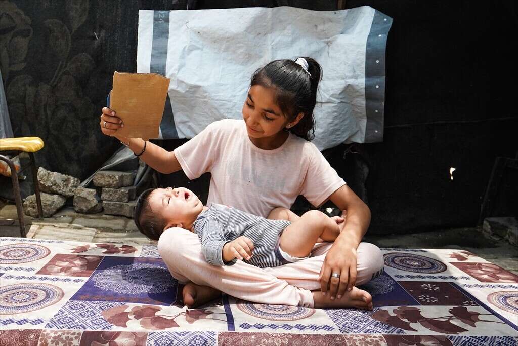 Filistinliler Gazze’de hem göçün hem sıcağın yükünü taşıyor