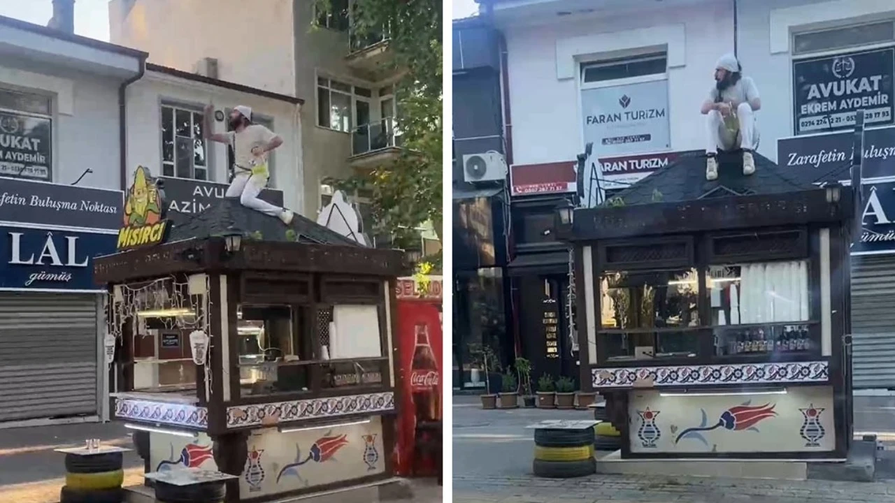Büfesini kurtarmak için çatıya çıktı, kendini zincirledi