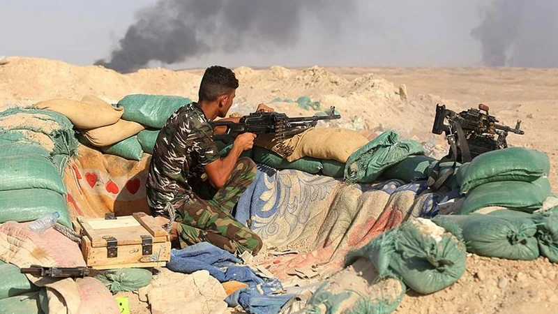 Irak'ta bir Şii milis grup daha silah envanterini hükümete teslim etti