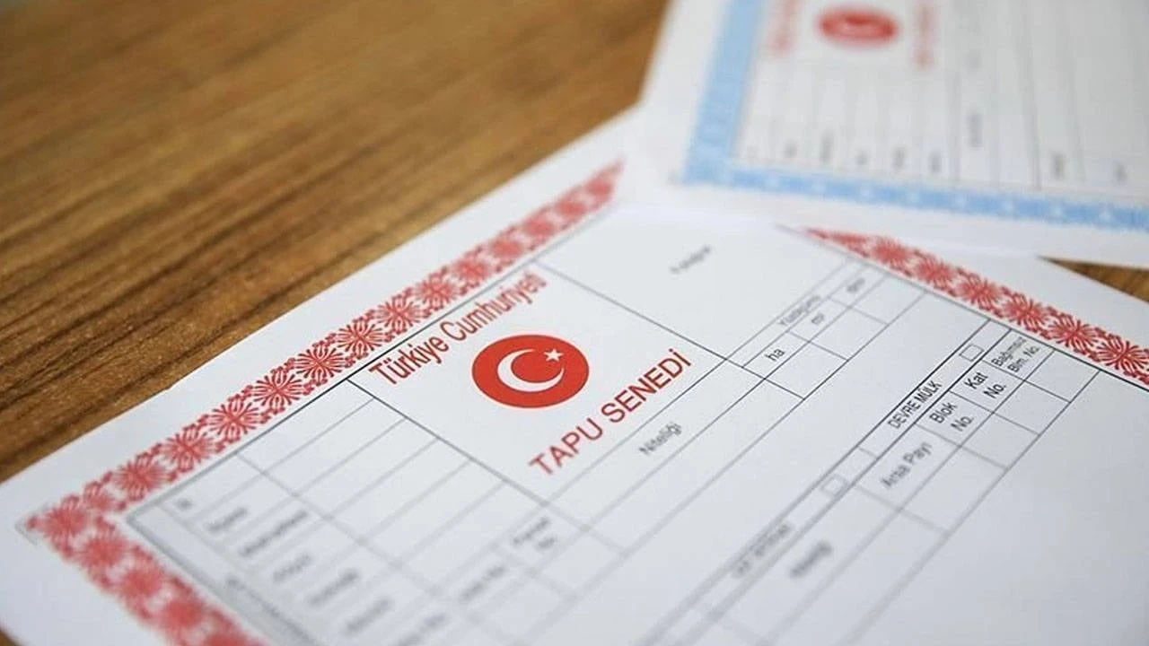 Taşınmaz satışında ''Güvenli Ödeme Sistemi'' uygulaması ertelendi