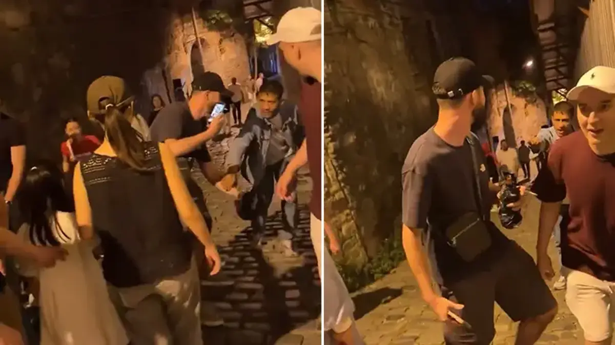 Galata'da 'fırça düşürme' numarası tutmadı! Rus turistler dolandırıcıyı fark etti